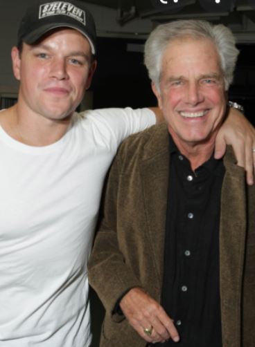 Kent Damon with his son